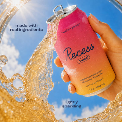 Fresh raspberries and lemon with Recess can showing real fruit sourcing benefit