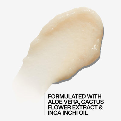 Aloe vera leaf with Redken bottle highlighting hydrating ingredient benefits