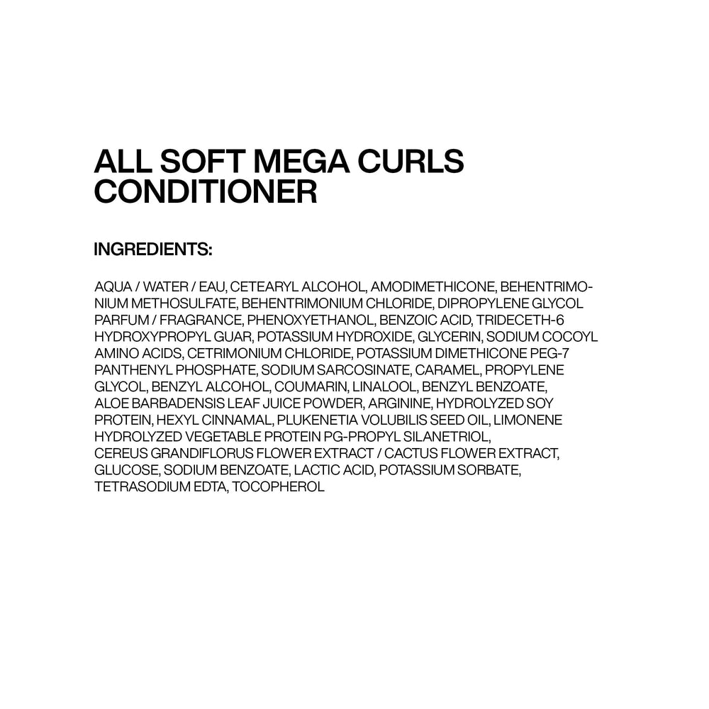 Curly-haired model using Redken product showcasing defined, shiny curls