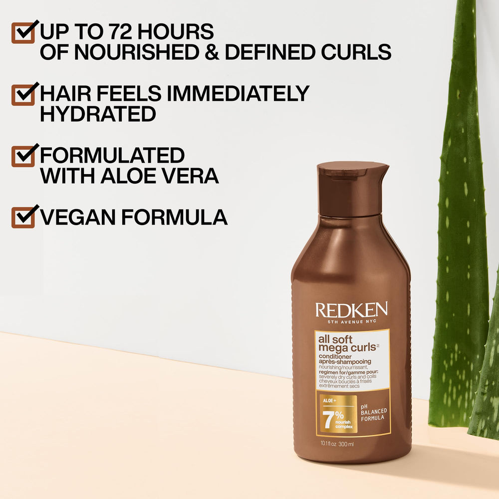 Redken conditioner creamy texture close-up demonstrating richness and slip