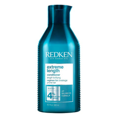 Redken front packaging showing bottle and label, professional brand benefit