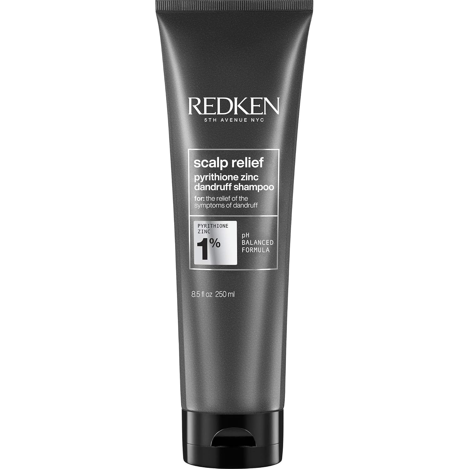 Redken envase frontal del champú anticaspa mostrando diseño profesional y limpieza