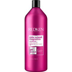Redken frasco frontal 33.8 oz mostrando marca y envase protector