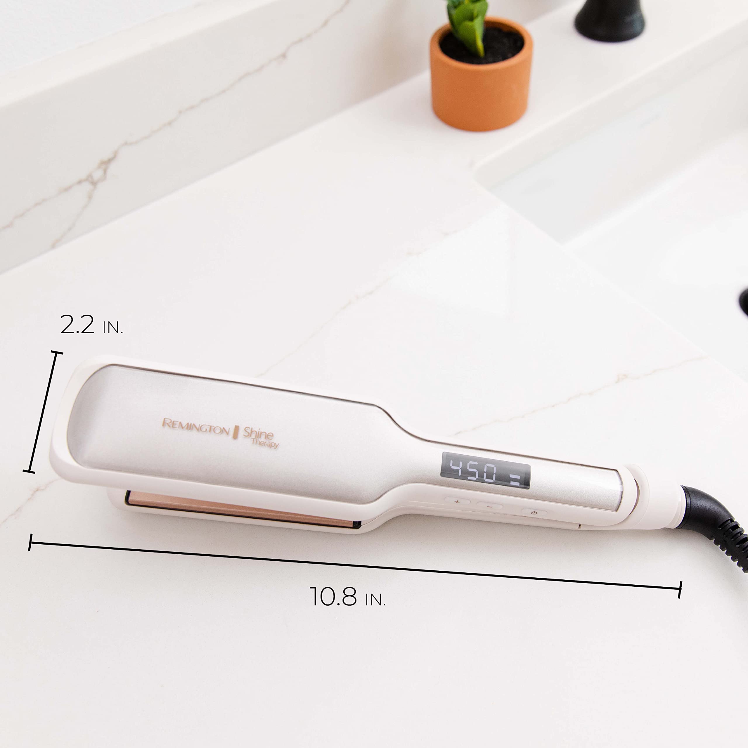 Remington packaged with travel case on vanity, ready for portable styling convenience