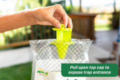 RESCUE! big bag hanging outdoors filled with trapped flies demonstrating effective control
