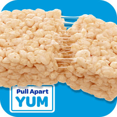 Rice Krispies Treats comparación de tamaño con mano para escala práctica