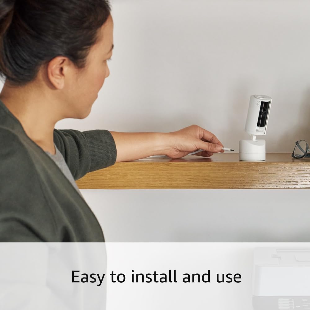 Ring Pan-Tilt Indoor Cam streaming on an Echo Show showing Alexa integration and hands-free viewing benefit