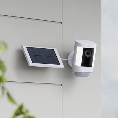 Ring small solar panel held in hand showing small size for flexible placement