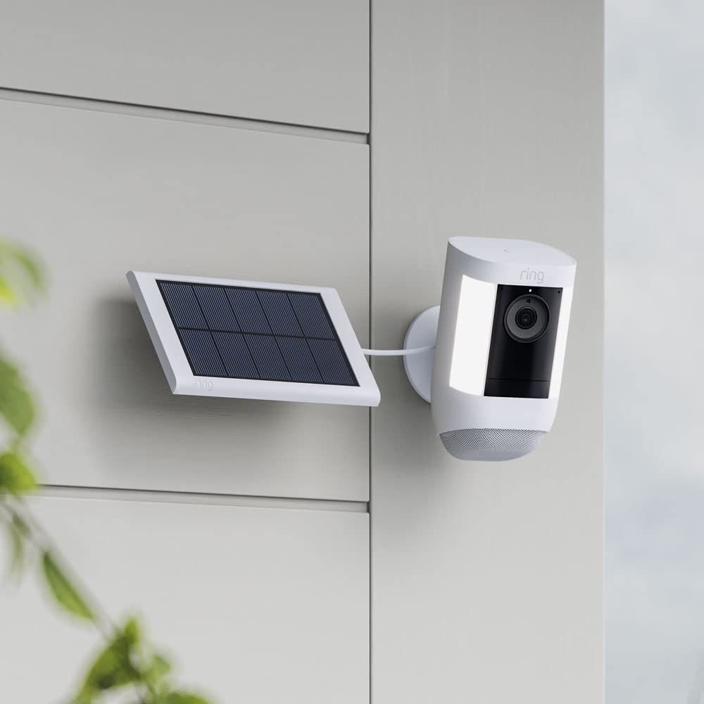 Ring small solar panel held in hand showing small size for flexible placement