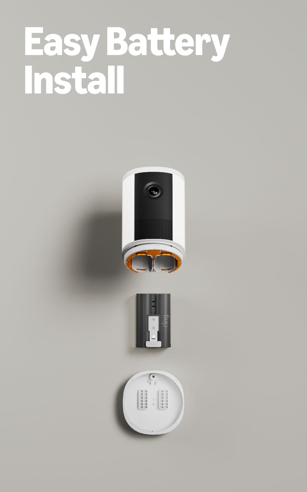 Ring Spotlight Cam held in hand to show compact size and flexible placement