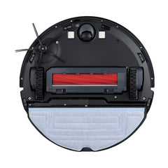 roborock cepillo en uso sobre suelo duro recogiendo polvo fino