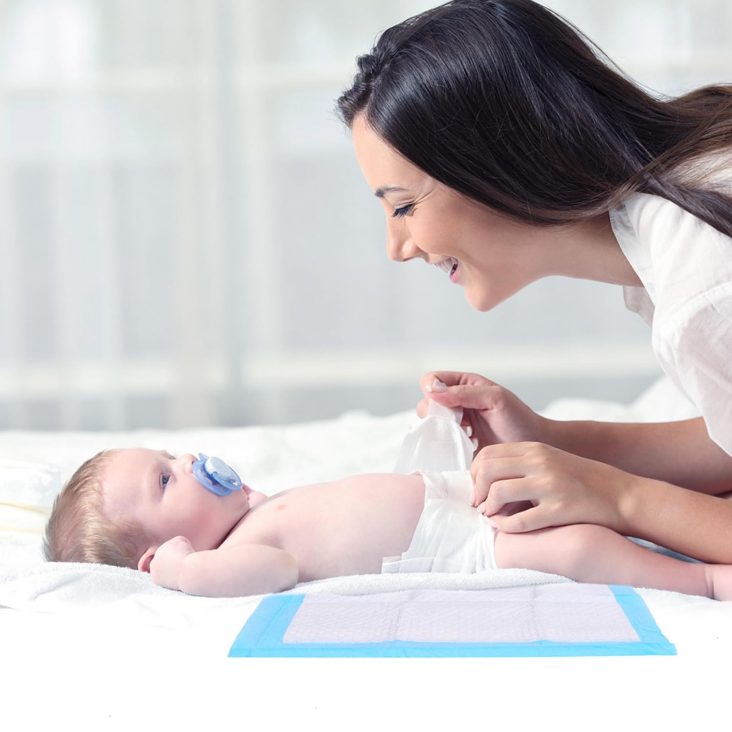 Rocinha pad on changing table protecting surface during use