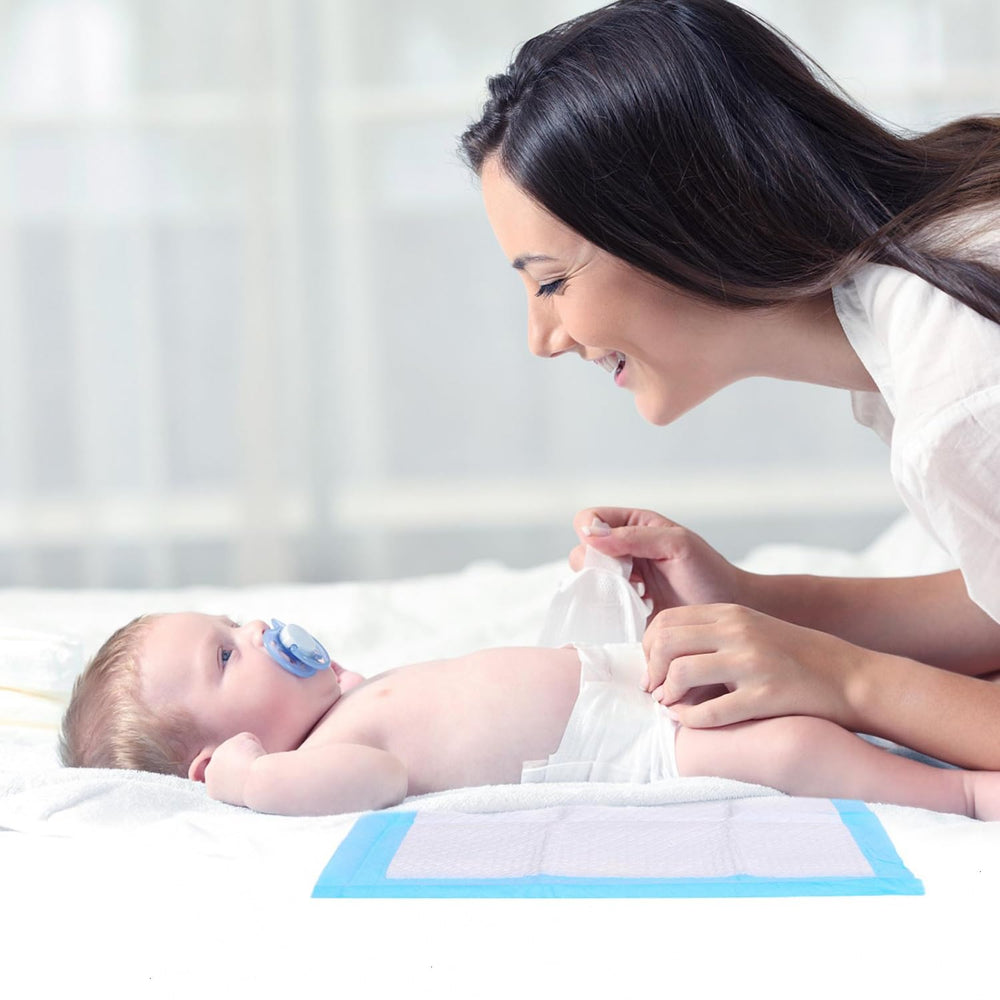 Rocinha pad on changing table protecting surface during use