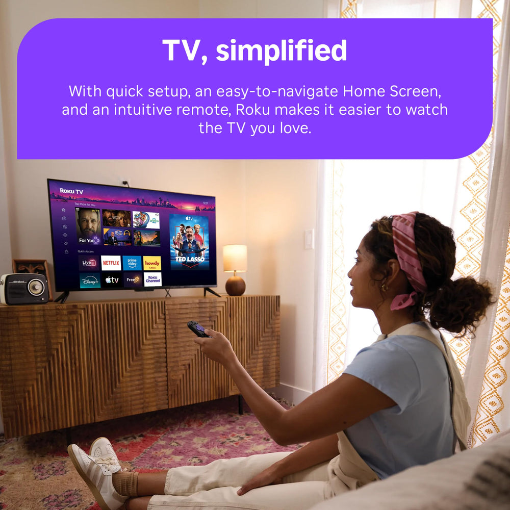 Roku TV wall-mounted in living room showcasing cinematic setup benefit