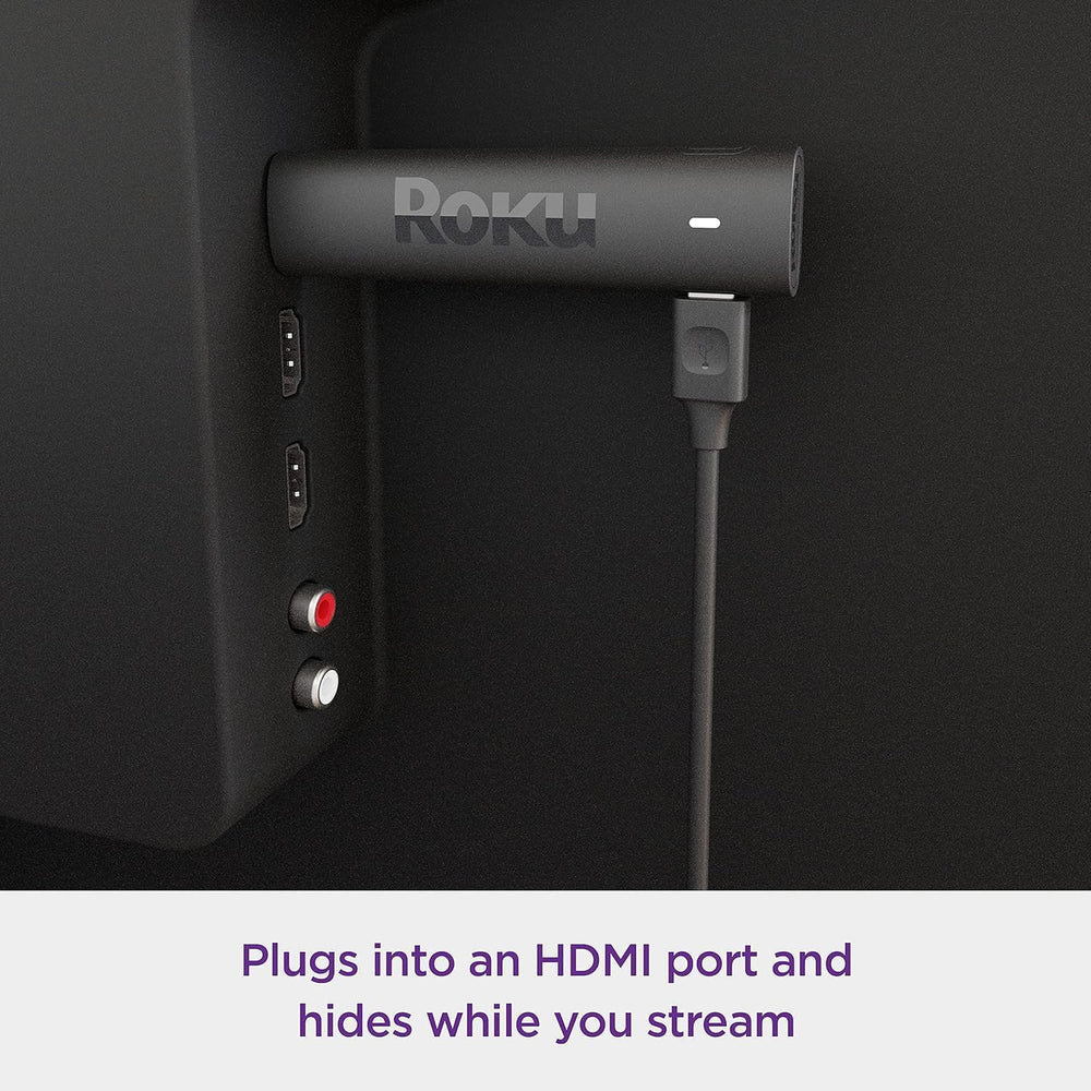 Roku streaming stick 4K conectado al puerto HDMI de un televisor moderno