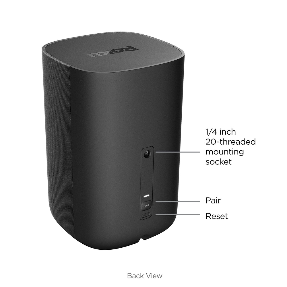 Roku speaker next to book showing compact size and scale
