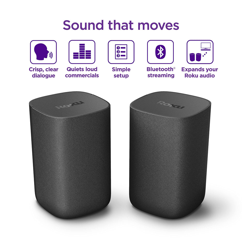 Roku speakers placed behind sofa for immersive surround effect