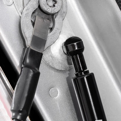 Rough Country installed on Ford truck driver-side hinge showing smooth lowering benefit