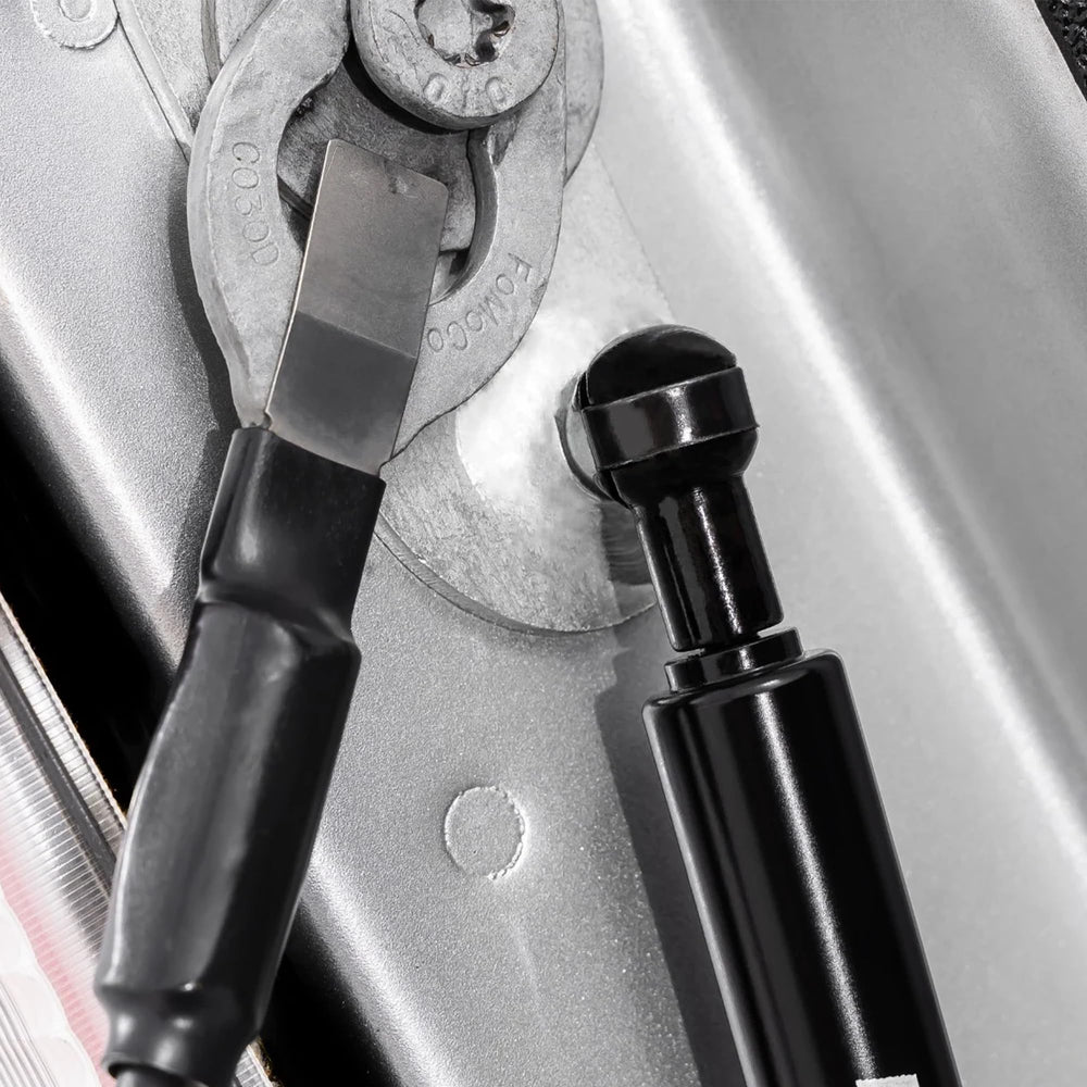 Rough Country installed on Ford truck driver-side hinge showing smooth lowering benefit