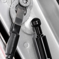 Rough Country installed on Ford truck driver-side hinge showing smooth lowering benefit