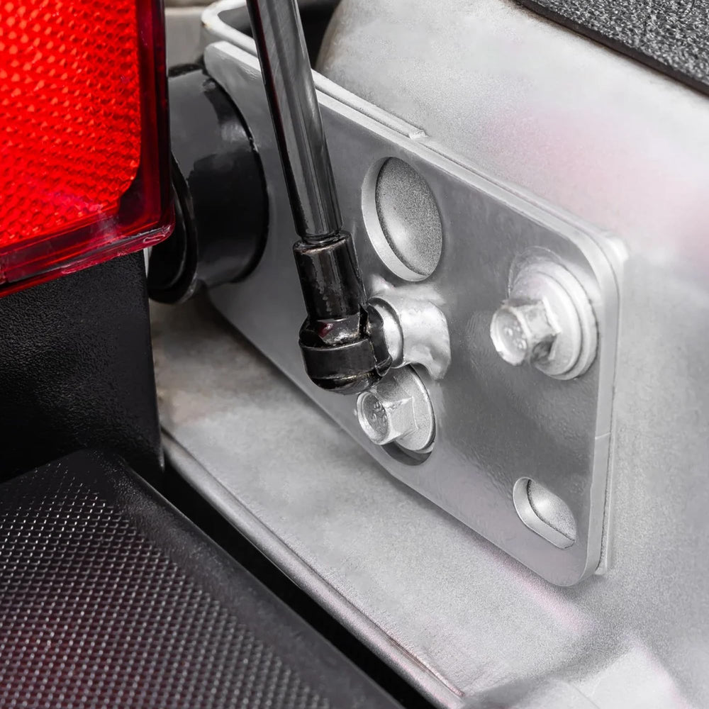 Rough Country tailgate assist with included hardware for straightforward bolt-on installation