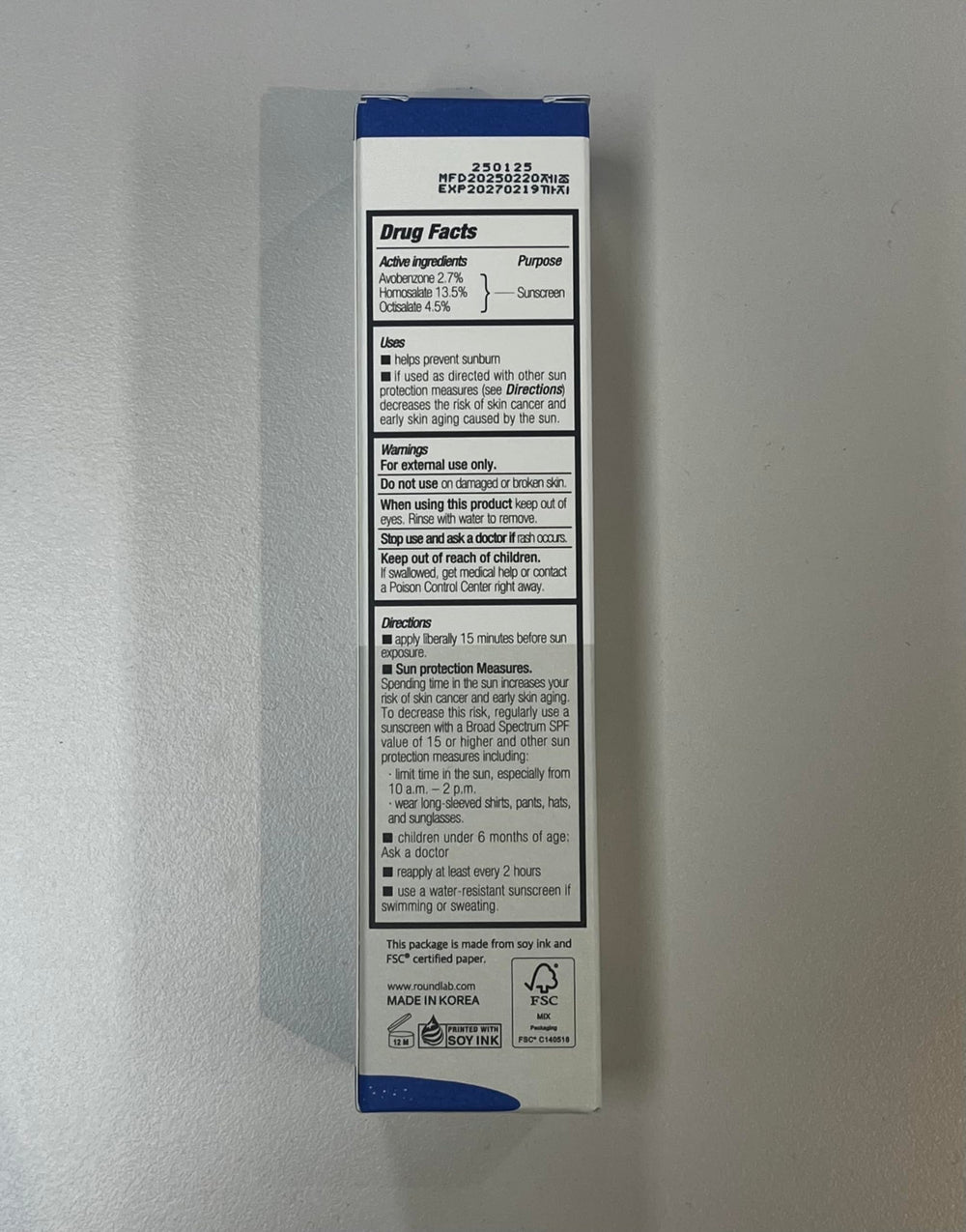 ROUND LAB sunscreen used outdoors indicating reliable daily UV protection