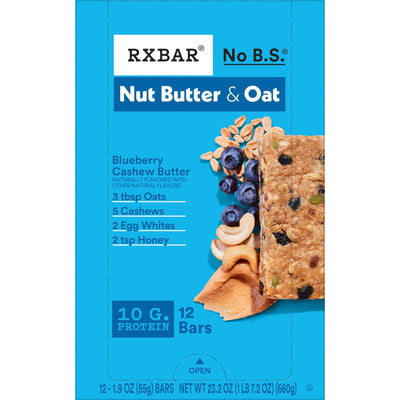 RXBAR barra junto a taza de café en oficina ideal para pausa y energía sostenida