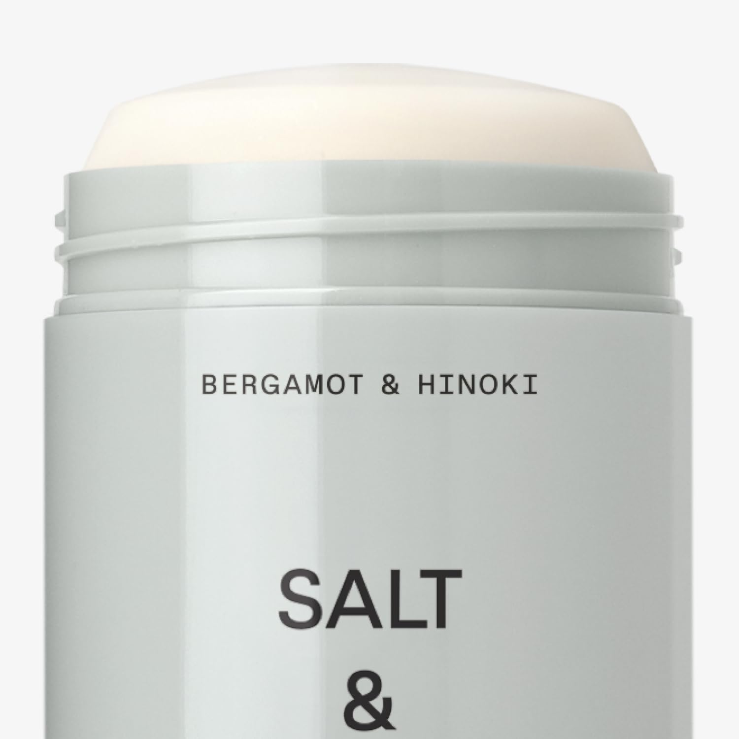 Salt & Stone envase abierto y cerrado enseñando el mecanismo de giro