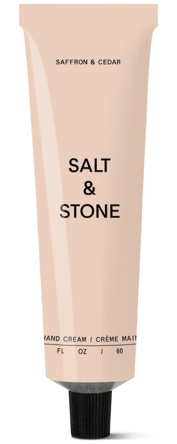 Salt & Stone envase frontal Azafrán y Cedro mostrando diseño y tamaño portable