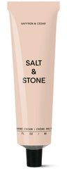 Salt & Stone envase frontal Azafrán y Cedro mostrando diseño y tamaño portable