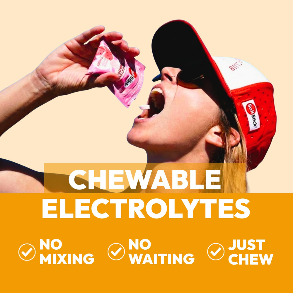 Close-up of SaltStick FastChews orange tablets showing texture and chewable size