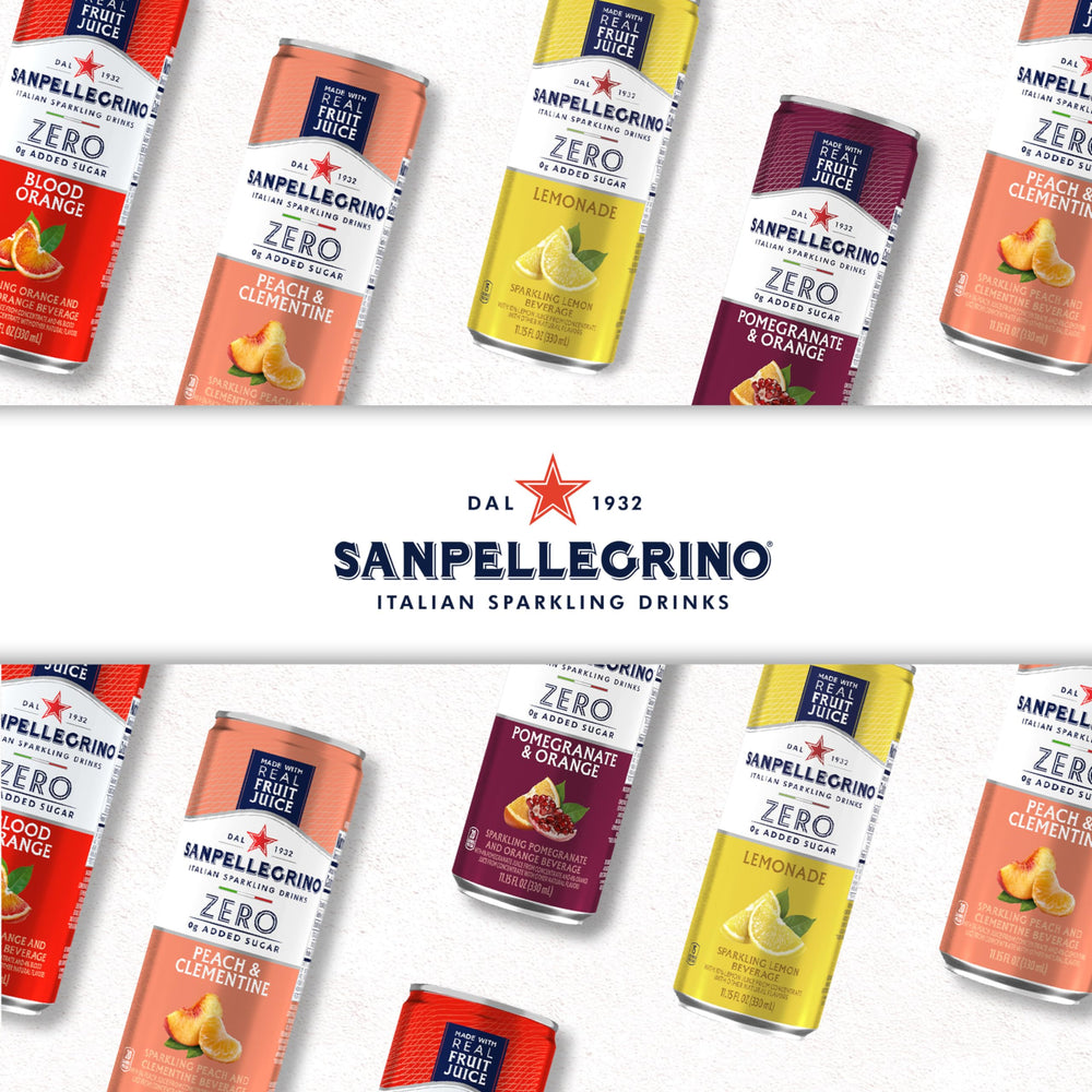 Sanpellegrino lata junto a granada y naranja que muestra ingredientes naturales
