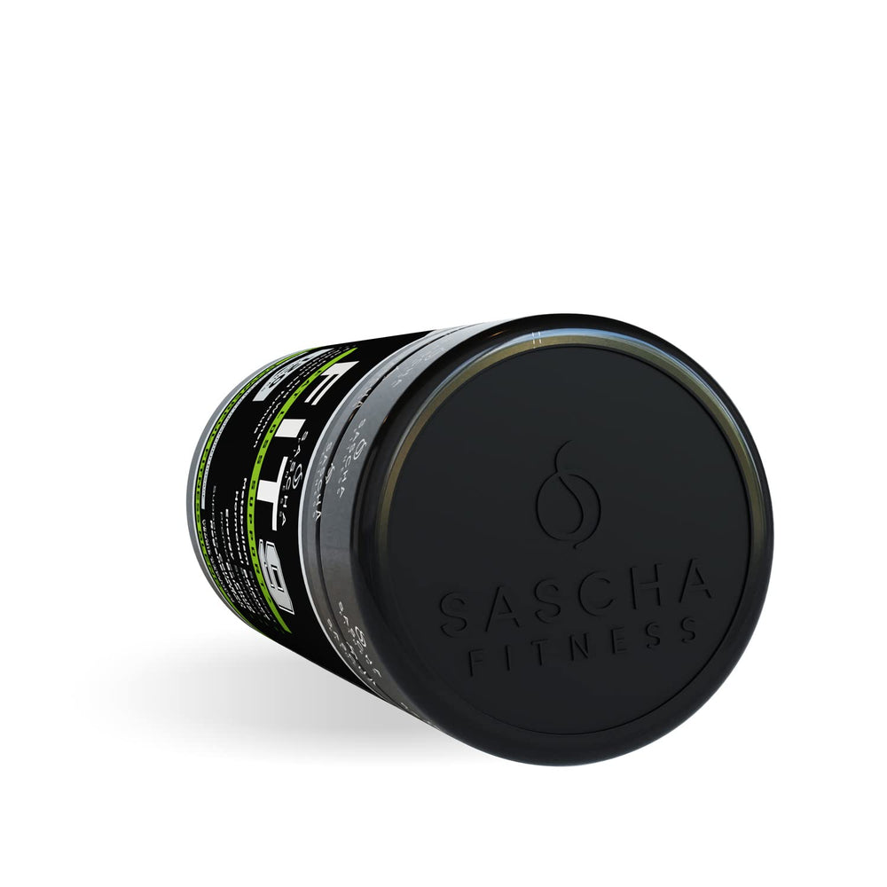 Sascha Fitness cápsula junto a moneda para escala de tamaño