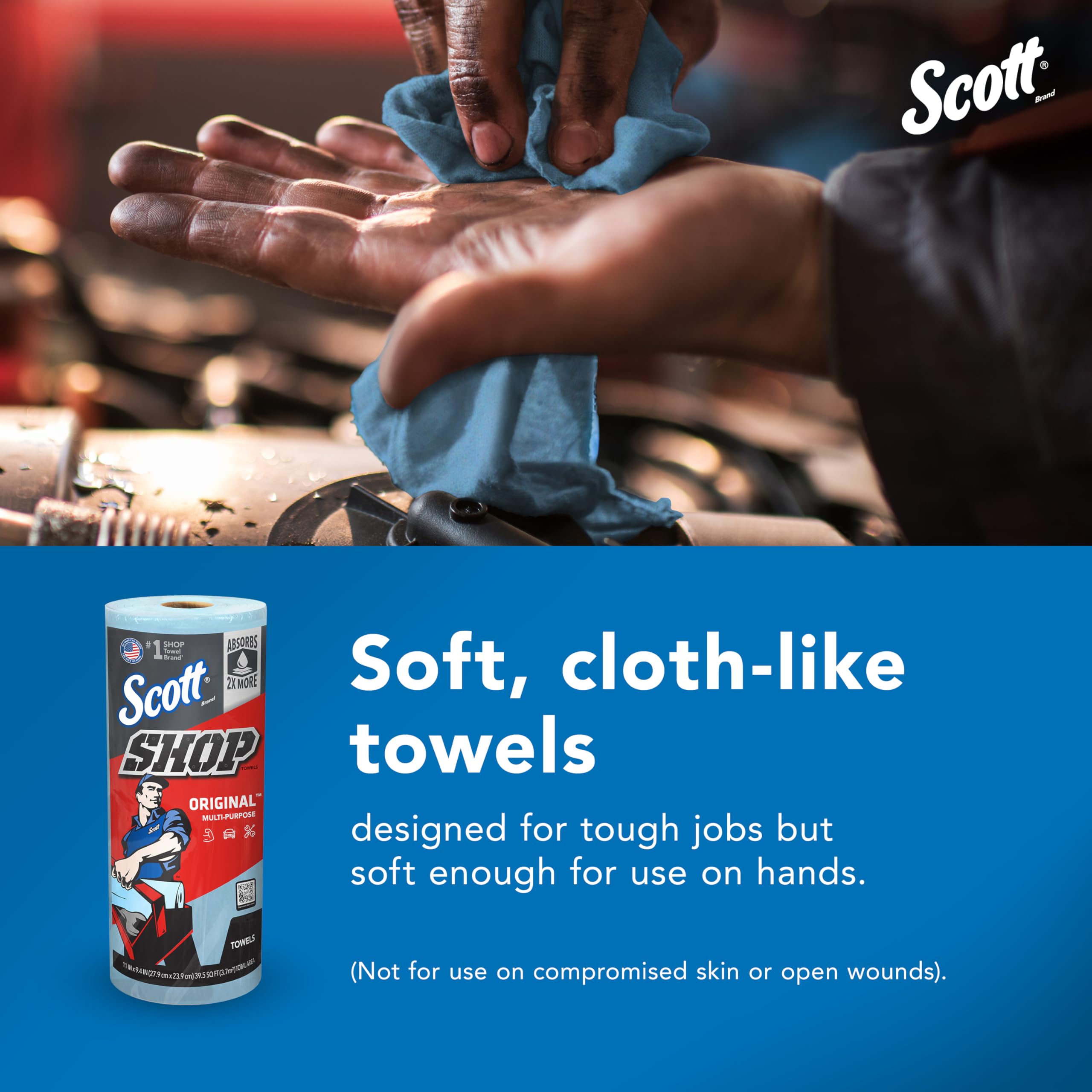 Scott towel wiping automotive tool and hands to remove grease effectively