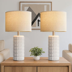 Seealle front view pair showing balanced bedside styling and warm light