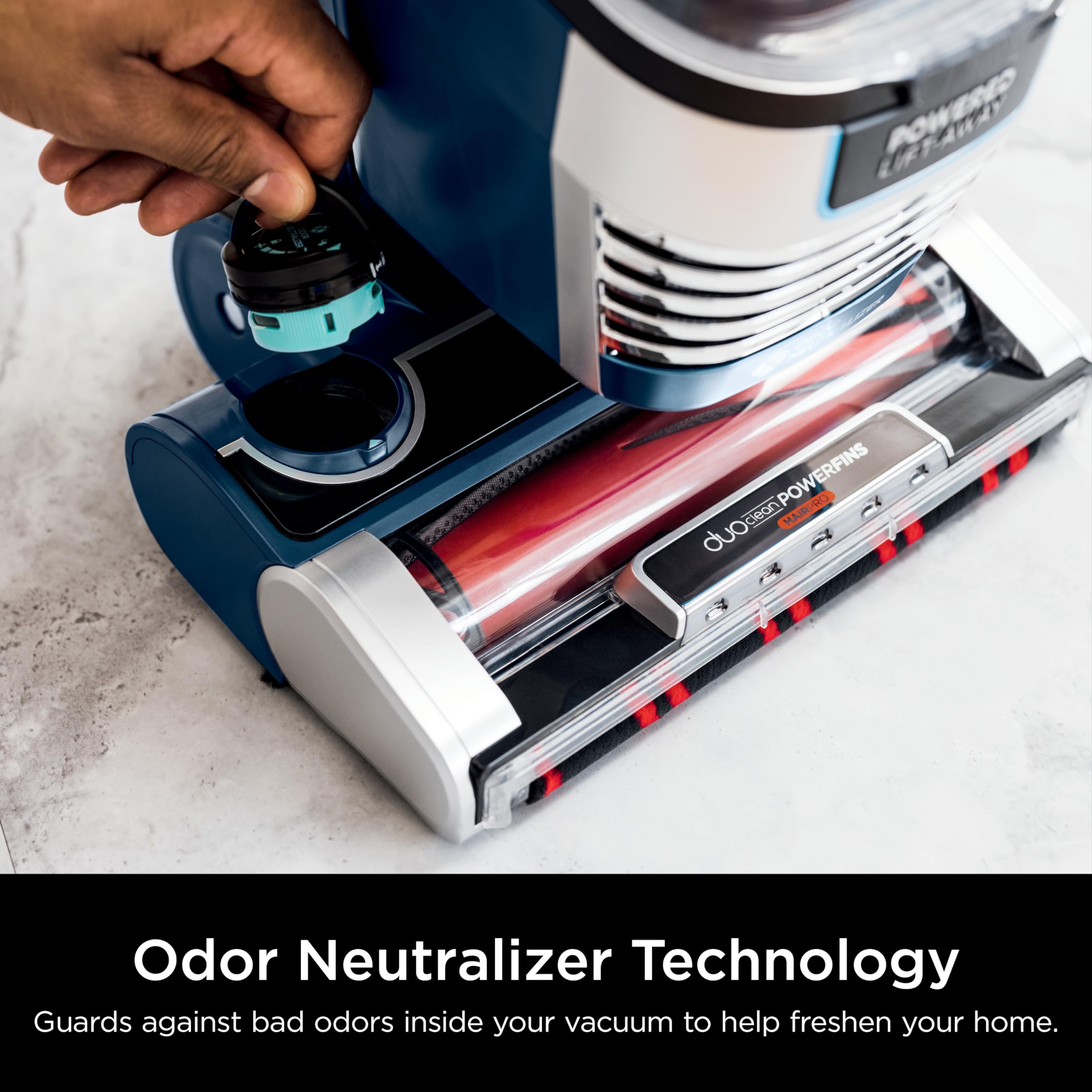 Shark Stratos on hard floor showing gentle roller for dust pickup