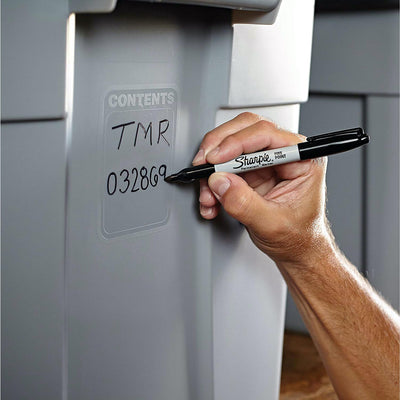 Person using Sharpie marker in workspace showing reliable everyday use benefit