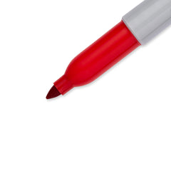 Hand holding Sharpie markers showing ergonomic grip and quick use
