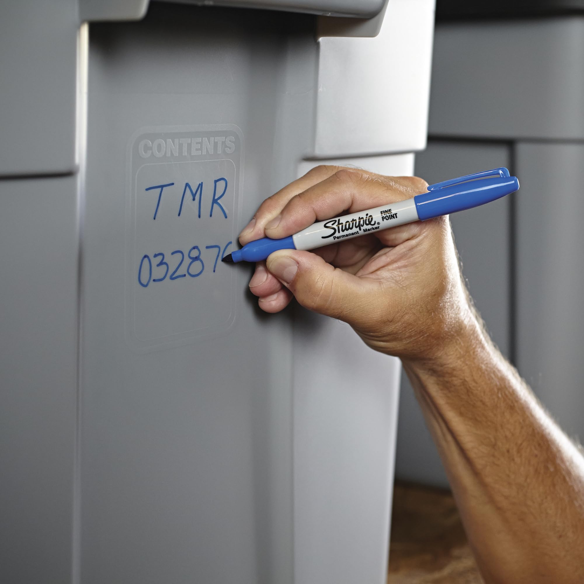 Hand holding Sharpie to show scale and comfortable ergonomic use