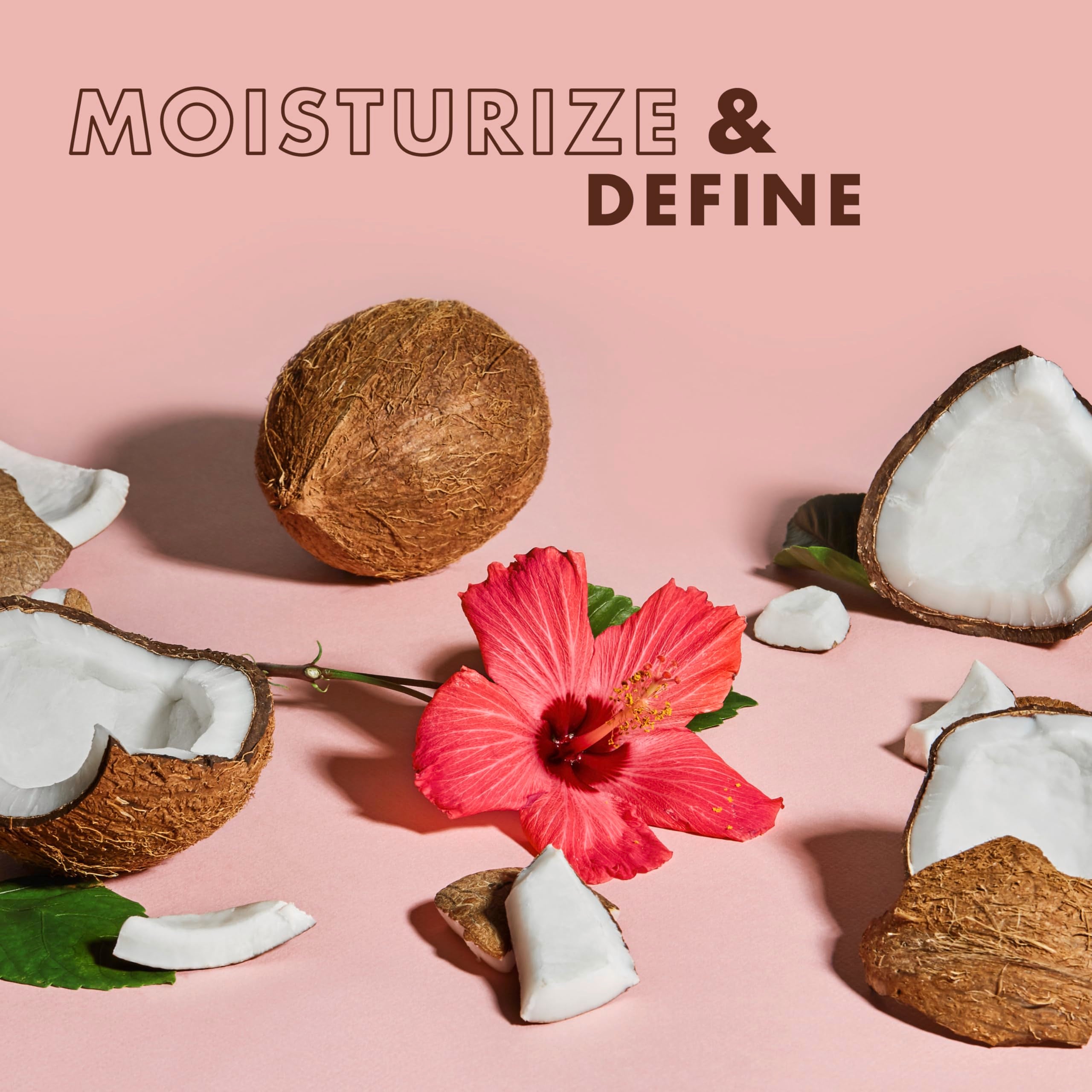 Shea Moisture botella abierta con gota de producto para ver consistencia rica