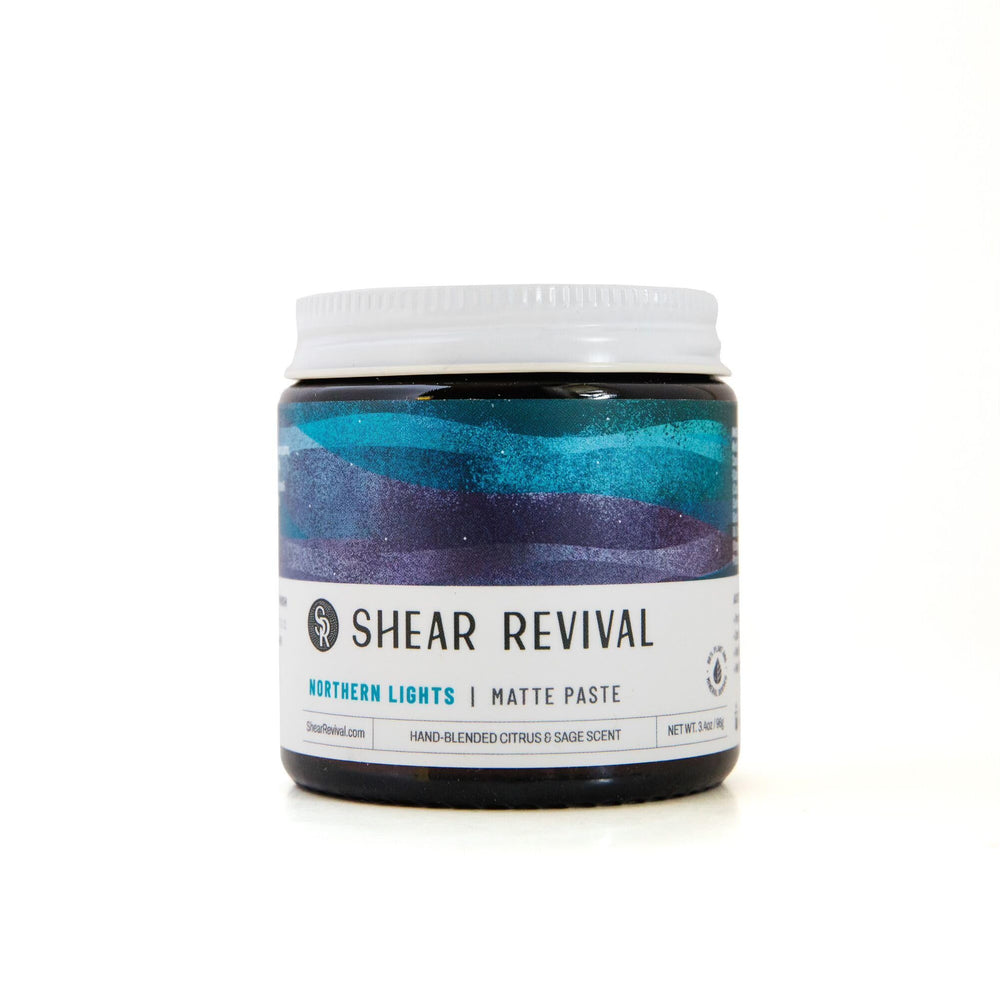 Shear Revival tarro frontal mostrando diseño y tamaño portátil, útil para viajar