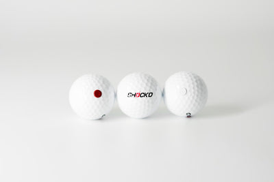 SHOCK'D GOLF BALLS textura dimple que asegura vuelo natural
