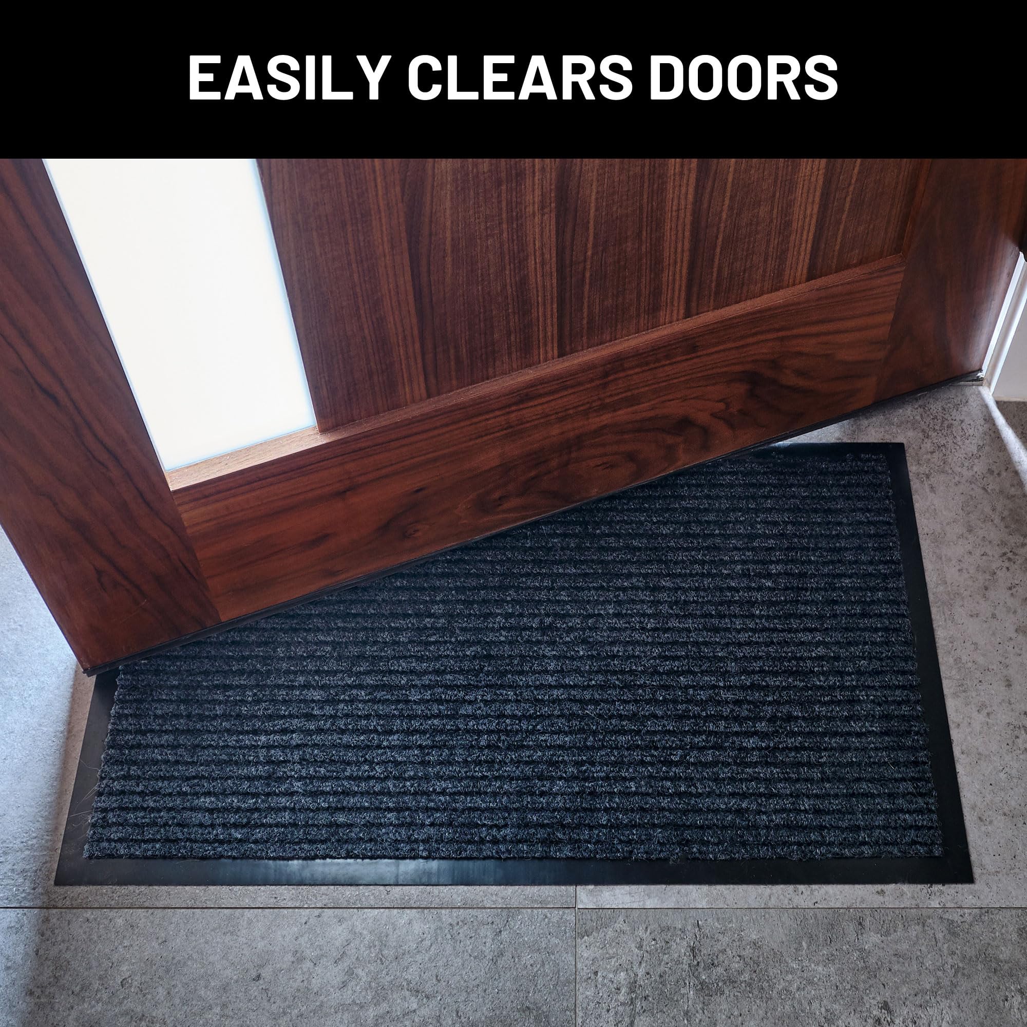 Sierra Concepts mat placed at front door catching shoes and debris at entry