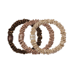 SLIP scrunchie frontal del paquete mostrando tonos y brillo beneficios estéticos