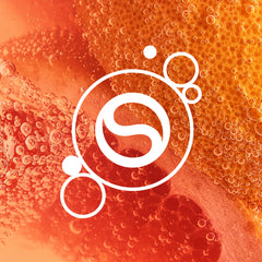 SodaStream gota de concentrado sobre fondo claro resaltando la textura