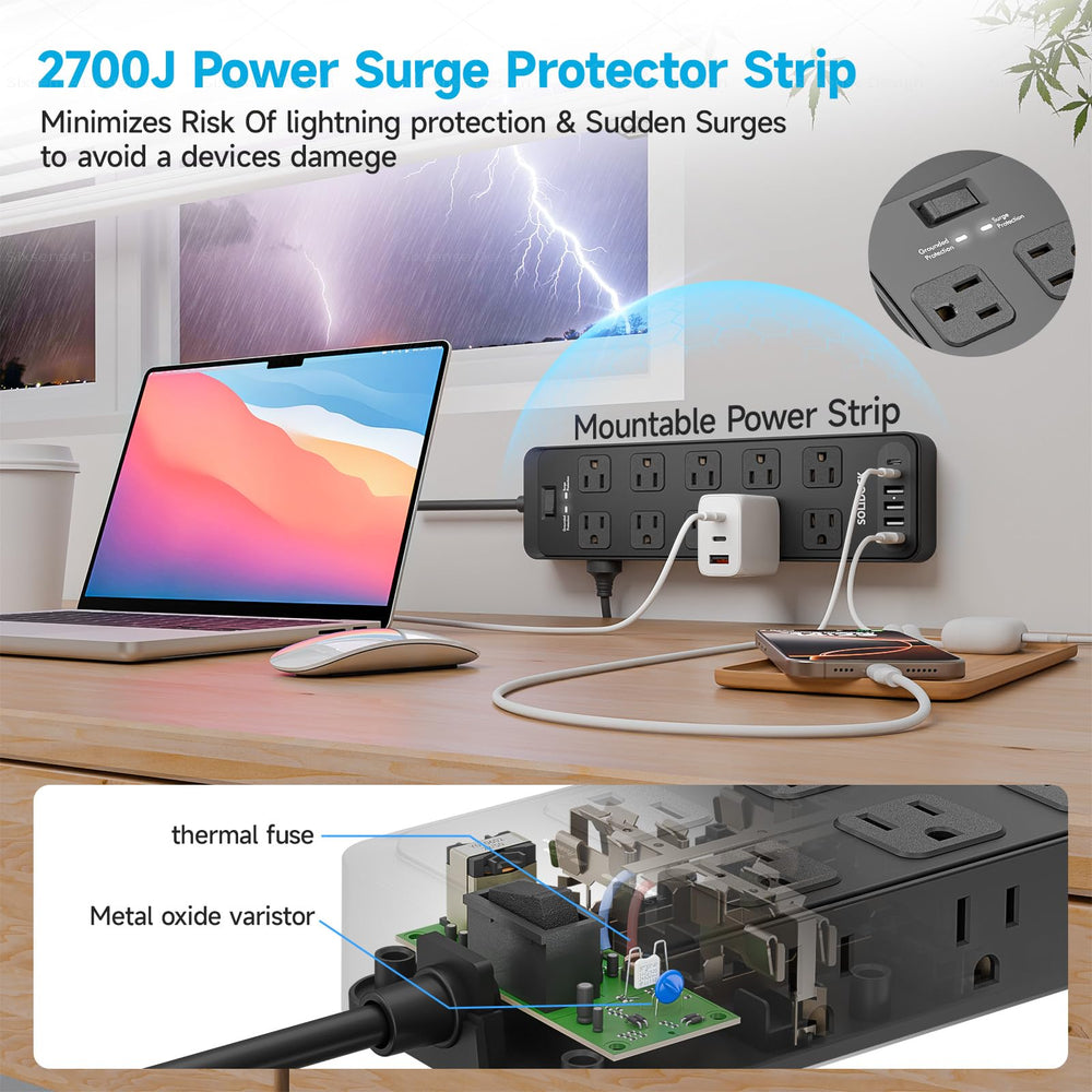 Regleta Solidock en uso sobre escritorio alimentando ordenador y monitor