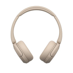 Sony WH-CH520 sostenidos en mano para comparar tamaño y ligereza