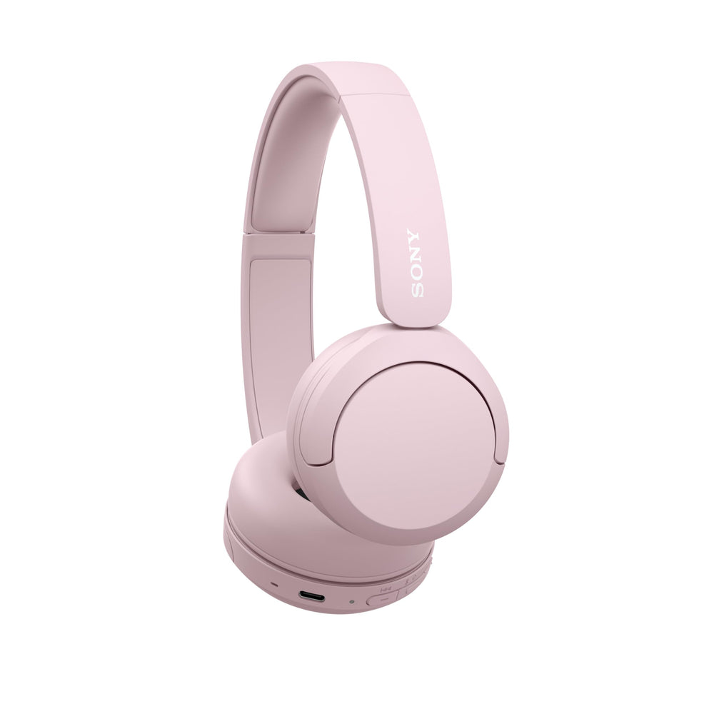 Sony WH-CH520 pink worn on head demonstrating lightweight comfort during use