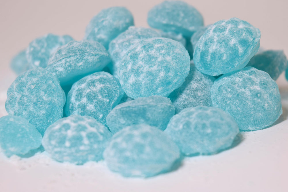 Sour Drops tamaño en mano para apreciar porción y portabilidad