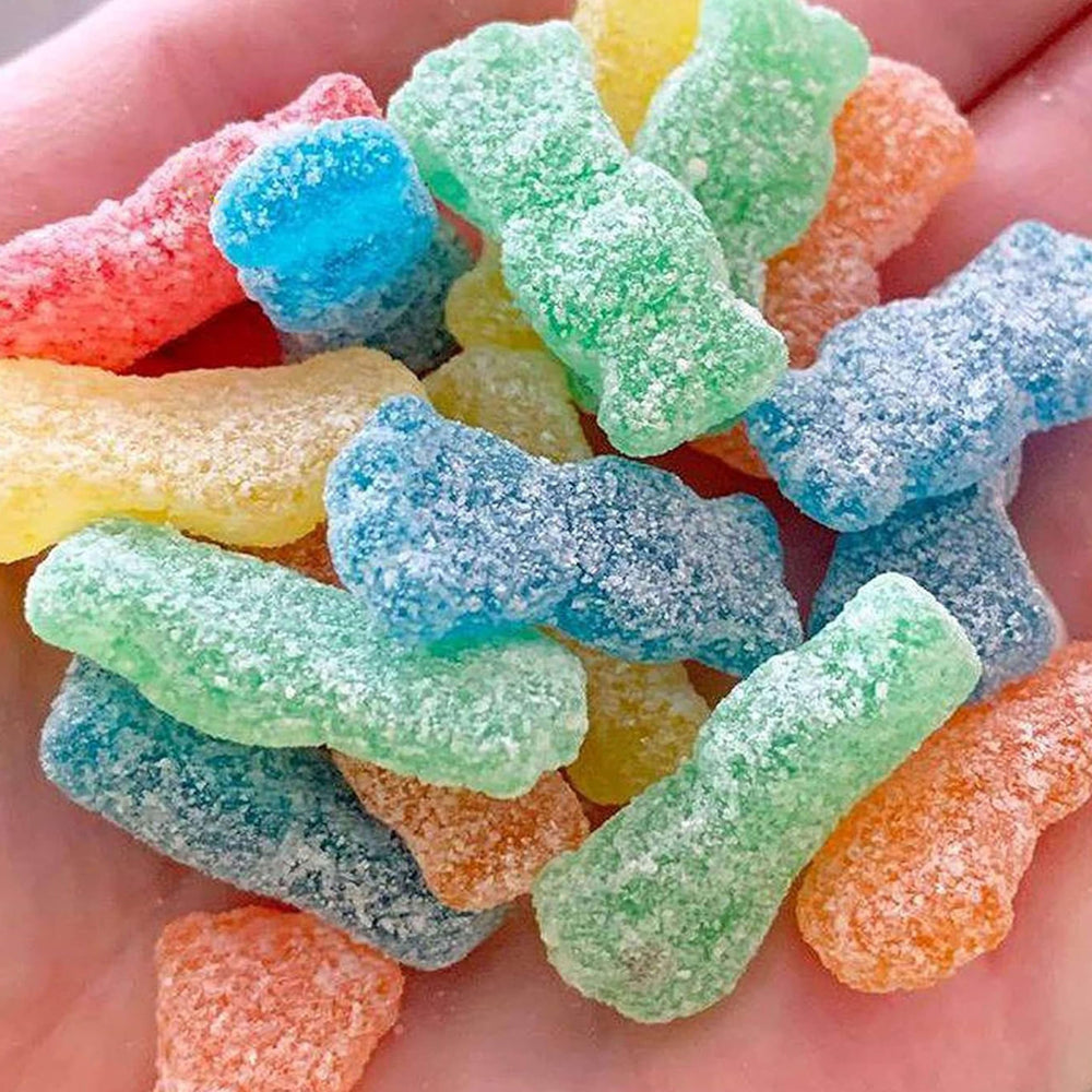 SOUR PATCH KIDS candy in a movie-night setting enhancing snack time